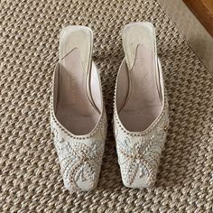 Gianni Milanesi Super Rare Vintage Woven Kitten Heel Mules Ivory. Us 7.5 Made In Italy. Beautiful Stitched Design- Perfect For Weddings, Parties, Casual. Sadly Didn’t Fit Me Because I’m A Size 8 But I Felt Optimistic. Couldn’t Find Them Anywhere Else! Note: One Of The Heels Rubber Tip Missing. Can Probably Be Replaced / Repaired. You Are Buying As Is. Depending On Phone Or Computer These Shoes May Look Light Brown- They Are Ivory In Color. #Oldmoney Feminine, Understated, Summer, Sandals Cream Slip-on Heels For Formal Events, Elegant Beige Embellished Heels, Elegant Embellished Beige Heels, Feminine Cream Wedding Shoes For Evening, Embellished Cream Heels For Evening, Embellished Cream Evening Heels, Evening Embellished Cream Heels, Elegant Embellished Slip-on Heels, Beige Embellished Heels For Formal Occasions