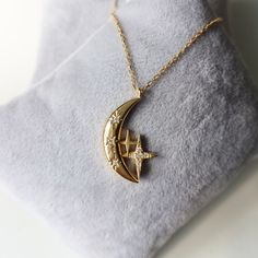 Collection : '' I see lots of stars but none of them is you'' 925 sterling silver 14K Gold Weight for 925 Silver : 4,85 gr (approximate) Weight for 14K Gold : 6.09 gr (approximate) FREE Fedex Express Shipping 2-7 business days to Worldwide ✦ Registered mail which require a signature ✦ We need your phone number for Fedex/TNT receipts. ✦ We can't send to PO BOX adresses. Luxury Gold Star Necklace, Engraved Star-shaped Yellow Gold Necklace, Celestial Hallmarked Necklaces For Anniversary, Celestial Style Hallmarked Necklaces For Anniversary, Engraved Star Yellow Gold Necklace, Celestial Sterling Silver Necklaces In Gold, Celestial Gold Sterling Silver Necklaces, Gold Celestial Necklace, Diamond Moon Necklace