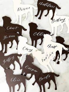 the silhouettes of dogs are shown in black, white and brown colors with names on them