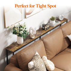 a couch with pillows and flowers on it in front of a white wall that says perfect for tight spot