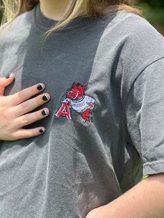 Confort Colors embroidered vintage Arkansas razorback shirt Embroidered Cotton Tops For College, Casual Tops With Custom Embroidery For College, Embroidered Short Sleeve T-shirt For College, Casual Tops With Embroidered Patch For Spring, Casual Embroidered Tops For College, Casual Spring Tops With Embroidered Patch, Embroidered Short Sleeve College T-shirt, College Embroidered Short Sleeve T-shirt, Vintage Embroidered Cotton T-shirt