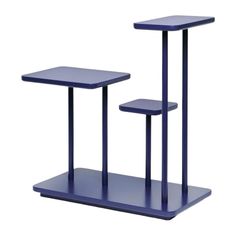 two blue tables sitting on top of each other