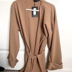 Prettylittlethings Dress/Jacket Long Sleeve Belted Blazer Dress For Date Night, Chic Mini Length Fall Blazer, Chic Fall Mini Blazer, Long Sleeve Blazer Dress For Date Night In Fall, Trendy Outerwear For Date Night In Spring, Long Sleeve Blazer For Fall Brunch, Chic Open Front Fall Dresses, Winter Long Sleeve Blazer For Brunch, Winter Long Sleeve Blazer For Date Night