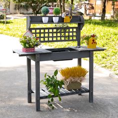 Check out this planting table from Outsunny! Our gardening table is made of high-quality fir wood, which not only makes is durable for the long run, but natural in the garden. The top surface of the garden workbench can slide outward, revealing a sink basin and storage for tools underneath. That sink basin can be used for cleaning and washing tools or plants. When the tabletop of the garden table for planting is in its unopened position, then you have great workspace. Storage For Tools, Table With Hidden Storage, Small Storage Shelves, Outdoor Storage Bench, Potting Tables, Potting Table, Outdoor Sinks, Wood Garden, Sink Basin