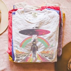 Get ready to show your style with our Outer Space Cowgirl T-Shirt! Perfect for a beach party, concert or or just a casual day out, this graphic tee is a must-have.  Proudly Printed on Comfort Colors® tees, for that insanely soft, vintage look and feel.  Without doubt, this will be your favorite shirt. With its vintage-inspired design, this shirt is perfect for those who love a boho, western, or retro look. The oversized fit and soft, comfortable fabric make it the perfect choice for a day on the Pop Culture Screen Print Tops For Summer, Summer Screen Print Pop Culture Tops, Summer Pop Culture Screen Print Tops, Unisex Tops For Summer Music Festival, Multicolor Crew Neck Top For Music Festivals, White Character Print Tops For Beach, Cotton Character Print Tops For Beach, Summer Pop Culture Top With Funny Print, Multicolor Screen Print Tops For Festival