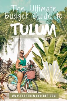 a woman standing next to a blue bike with palm trees in the background and text overlay that reads, the ultimate budget guide to tullam