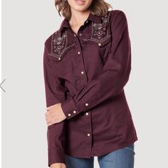 Beautiful Wrangler Womens Embroidered Western Shirt. You'll Be The Best-Dressed At The Rodeo In Wrangler's Womens Retro Western Snap Shirt. This Cowgirl Staple Comes With Fine Embroidery On The Fancy Yokes At The Shoulders. It Also Comes With A Pointed Yoke In The Back For An Extra Touch Of Authenticity. The Pointed Collar And Full-Length Pearl Snap Closure Will Keep You Looking Polished For Competition, Play, And Everything In Between. Long Sleeve Back: Exaggerated Back Yoke Collar: Spread Cuff Womens Chambray Shirt, Embroidered Western Shirt, Overshirt Women, Shrunken Sweater, Yoke Shirt, Fine Embroidery, Floral Long Sleeve Shirt, Perfect Blouse, Retro Western