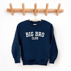 Looking for a cute sweatshirt for your kids? We have the perfect Big Bro Club graphic sweatshirt addition to their closet! Also available in toddler sweatshirts. Club Sweatshirts, Big Sis, Kids Clothes Boys, Cute Sweatshirts, Top Graphic Tees, Kids Outfits Girls, Girl Sweatshirts, Fleece Hoodie, Women Clothes Sale