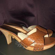 Never Worn, Though Missing Tags And Box Currently. Perfect Condition. 100% Authentic, Size 7.5. Elegant Open Toe Clogs With Padded Heel, Elegant Open Toe Clogs With 4-inch Heel, Elegant Brown Open Toe Clogs, Designer Brown Heels With Wooden Heel, Elegant Slip-on Heels With Wooden Heel, Formal Open Toe Clogs For Summer, Formal Open Toe Summer Clogs, Elegant Brown Summer Clogs, Designer Sandals With Wooden Block Heel