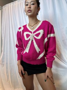 73% acrylic  19% nylon 4% wool 3% angora rabbit hair  Fits M/L Fall Sweater With Bow And Long Sleeves, Long Sleeve Sweater With Bow For Fall, Long Sleeve Fall Sweater With Bow, Pink Sweater For Winter Party, Pink Winter Party Sweater, Casual Pink Sweater For Party, Winter Party Sweater, Pink Sweater For Fall Party, Pink Fall Party Sweater