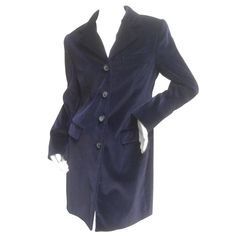 Alberto Forti Roma midnight blue cotton velvet coat The stylish 3/4 length Italian coat is designed with plush dark blue cotton velvet Adorned with four large resin buttons stamped Alberto Forti Roma. Designed with a single chest pocket and two flap covered side pockets Each sleeve cuffs has four designer buttons Lined in black satin acetate No size label intact Refer to measurements The length from the top center collar to the hem = 34" inches The length from the shoulder to the hemline = 35" inches The underarm bust section when buttoned side to side = 18" inches The complete bust buttoned measures 36" inches The shoulders measure 15" inches seam to seam The outer sleeve length measures 23" inches The inner sleeve length measures 16.5 inches The waist section buttoned measures 32" inches Winter Velvet Single-breasted Outerwear, Long Velvet Coat For Fall, Blue Velvet Winter Outerwear, Winter Velvet Outerwear With Button Closure, Designer Buttons, Resin Buttons, Velvet Coat, Say Yes, Cotton Velvet