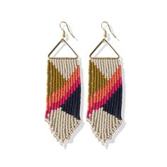 Fabulous free-flowing fringe is just what your jewelry box needs! Part of Ink + Alloy's seed bead collection, the Emilie Angles handmade statement earrings are lightweight enough for all-day wear but bold enough to make a big statement. These amazing fringe earrings offer a unique look as they hang from a brass triangle at the top. Approximately 4.5 x 1.125 inches.Made By Artisans In India.Glass Beads.Colors may fade from sun exposure. Bead Collection, Rainbow Chevron, Beaded Fringe Earrings, Alloy Earrings, Triangle Earrings, Beaded Dangle Earrings, Beaded Fringe, Seed Bead Earrings, Modern Bohemian