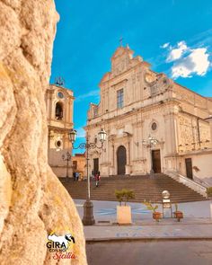 an old church with steps leading up to it