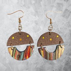 Add to your fall wardrobe with these fall inspired earrings. With the shades of brown, red and blue, these earrings would match great with a comfy sweater and boots. Trendy Brown Jewelry With Ear Wire, Brown Jewelry Gift For Fall, Brown Jewelry For Fall Season Gift, Earthy Multicolor Earrings Perfect For Gifts, Brown Jewelry For Fall Gifts, Handmade Multicolor Jewelry For Fall, Trendy Brown Hoop Earrings For Everyday, Trendy Brown Dangle Earrings, Artsy Brown Earrings With Ear Wire