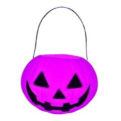 a purple pumpkin shaped bag with black eyes on the front and sides, hanging from a string