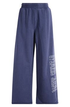 The weekend is calling in these slouchy cotton sweatpants designed with a sporty side logo and easy wide legs. 31" inseam; 25" leg opening; 13 1/2" front rise; 17" back rise (size Medium) Elastic waist 100% cotton Machine wash, tumble dry Imported Open Leg Sweatpants, Unisex Sweatpants, Baggy Sweats, Navy Sweatpants, Cute Sweatpants, Baggy Sweatpants, Sweatpants Outfit, Cotton Sweatpants, Wide Leg Sweatpants