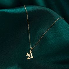 "14k Solid Gold Swallow Necklace, Swallow Bird Necklace for Women, Bestfriend Necklace Gift, Gold Bird Necklace, Gold Swallow Pendant DIALOOK JEWELRY ITEM DETAILS Material: 14K Solid GOLD (Not Filled or Plated). Gold Necklace Chain Length: 16,7\" inch (42,5cm) Main Chain and 1\" inch (2,5cm) Adjustable Chain Part Total: 17,7\" inch (45cm) Chain Width: 1mm Finish: 14K Yellow Gold Featuring: 11mm x 9,5mm Bird Pendant Stone: Zircon Each order will be beautifully packaged for gift giving in a jewelr Yellow Gold Necklace For Wedding, 14k Gold Necklace With Lobster Clasp As Gift, Elegant 14k Gold Charm Necklace With Lobster Clasp, Daisy Necklace, Bird Necklace, Bird Pendant, Necklace Chain Lengths, Friend Necklaces, Solid Gold Jewelry