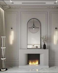 a white fireplace with a mirror above it and candles on the mantle next to it