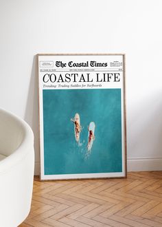 the coastal times magazine cover is displayed in an empty room