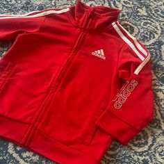 Nwot: Adidas Baby Zip Hoodie. Sz 12mo. Red. Side Pockets. 100% Polyester. All Bundles Are Discounted Red Tops For Fall Playtime, Red Cotton Outerwear For Playtime, Red Winter Playwear Tops, Adidas Red Winter Tops, Red Adidas Tops For Winter, Red Outerwear For Playtime In Fall, Red Outerwear For Fall Playtime, Adidas Baby, Adidas Sweatshirt