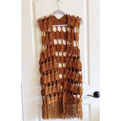 Do you love boho style? If so this vest is for you white and spring colors with fringe. ~~Measurements~~ 40 inches long (including fringe) ~~Size~~ S/M Please feel free to message me for custom colors and sizes. I love to crochet. Sleeveless Crochet Top With Crochet Trim For Fall, Fall Sleeveless Crochet Top With Crochet Trim, Handmade Bohemian Crochet Top, Bohemian Fringe Vest For Festivals, Fitted Bohemian Crochet Top For Fall, Hippie Crochet Top For Fall, Bohemian Crochet Top With Crochet Trim For Fall, Brown Fringe Vest For Festival, Festival Fringe Brown Vest