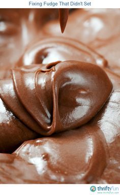 a close up of chocolate frosting on top of each other with the words fixing fudge that didn't set