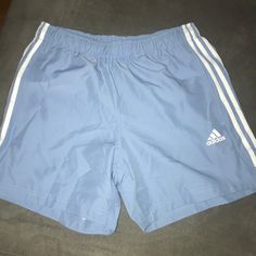 Pale Blue Color With White Piping On Sides. New With Tags. Size Medium Not Easily Found In Usa. Bought In Australia Casual Adidas Blue Shorts, Casual Blue Adidas Shorts, Adidas Blue Shorts With Three Stripes, Adidas Blue Shorts For Summer, Blue Shorts With Three Stripes For Summer, Adidas Blue Cotton Shorts, Adidas Blue Sports Shorts, Casual Adidas Beach Shorts, Adidas Blue Cotton Bottoms