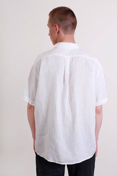 "Pure linen men's shirt for casual wear, made in organic certified by OEKO-TEX standard 100 linen. Shirt with short sleeves and collar-stand, yoke at back and with both side pleat at back. Shirt center back length- 75cm (29.5\"). Item quality - washed and softened, should not shrink anymore. On picture model wears shirt in size S, milky white linen. Linen men's pants listing please find here: www.etsy.com/listing/542456269/linen-trouser-for-men-casual-style-mens?ref=shop_home_active_6 Shirt for White Short Sleeve Shirt With Spread Collar Relaxed Fit, White Relaxed Fit Short Sleeve Shirt With Spread Collar, Classic White Summer Shirt, White Classic Short Sleeve Shirt With Relaxed Fit, Classic White Short Sleeve Shirt With Relaxed Fit, Casual White Linen Short Sleeve Shirt, White Short Sleeve Shirt With Spread Collar, White Linen Tops With Placket, Classic White Relaxed Fit Short Sleeve Shirt