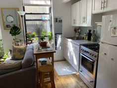 the kitchen is clean and ready to be used as a living room or dining area