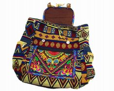 This Tribal Embroidered Boho Backpack is made to carry just about anything, your cute purse, tablet or phone, make-up, etc. It appears small but it can carry a day's essentials. Specs: Material: Linen/ Polyester Soft Handle Silt Pocket Magnetic closure Multicolor Portable Bags For Back To School, Adjustable Multicolor Rectangular Bag, Multicolor Portable Rectangular Backpack, Portable Multicolor Rectangular Backpack, Traditional Multicolor Backpack For Travel, Multicolor Portable Standard Backpack, Multicolor Rectangular Backpack For Trip, Embroidered Shoulder Backpack For Daily Use, Multicolor Adjustable Shoulder Bag For Travel