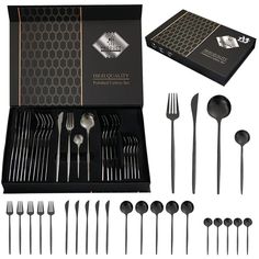 an assortment of silverware in a black box