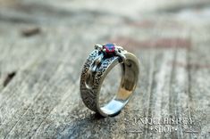 This ring is the unique and original design of Unique History Shop brand. Can't be found in any other Etsy stores! This is a unique handmade ring Metal: 925 silver, sterling silver Weight: 6 g (depends on size) Made with Cubic Zirconia Semi-precious Stone Lead, nickel, cadmium free & hypoallergenic Color the same as pictures Great Details Made-to-order We can make it in any size you need! (check options) Dear customer, if you have any questions - don't hesitate to contat me! :) Unique Hand Forged Engraved Promise Ring, Unique Engraved Promise Ring, Vintage Tension Setting Ring Jewelry, Unique Handmade Engraved Promise Ring, Vintage Jewelry With Tension Setting As A Gift, Vintage Tension Setting Ring, Unique Hand Forged Engraved Ring For Gift, Unique Engraved Ring For Promise, Unique Sterling Silver Jewelry With Tension Setting