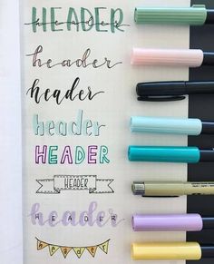 some pens are lined up on top of a notebook with the words, leader and leader