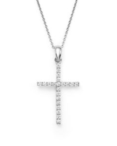 A straightforward yet elegant diamond cross pendant necklace cast in 14K white gold. Classic Diamond Accents Cross Pendant Necklace, Classic Diamond White Cross Necklace, White Gold Cross Necklace With Single Cut Diamonds, White Crucifix Cross Necklace With Brilliant Cut, Diamond White Cross Pendant Necklace With Brilliant Cut, White Gold Diamond Cross Pendant Necklace With Pavé Setting, Fine Jewelry Diamond Necklace With Brilliant Cut Cross Pendant, Brilliant Cut Diamond Cross Pendant Necklace, Elegant Brilliant Cut Diamond Cross Pendant Necklace