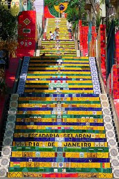 the stairs are covered in many different colored tiles