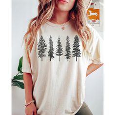 Elevate your outdoor style with our Pine Trees shirt. This evergreen trees forest t-shirt is a perfect gift for nature lovers, featuring a serene design of Norfolk Pine Trees. Ideal for camping or hiking enthusiasts, its minimalist aesthetic captures the essence of the great outdoors. Our Garment-Dyed Heavyweight t-shirts are relaxed and UNISEX sized.  A great go to shirt for those who appreciate a structured fit, made from a thick but breathable comfy material. The double-needle stitching throu Camping Tshirt Ideas, Norfolk Pine Tree, Outdoorsy Shirt, Upcycle Clothing, Norfolk Pine, 2023 Clothing, Cricut Shirts, Trees Forest, Wardrobe Wishlist