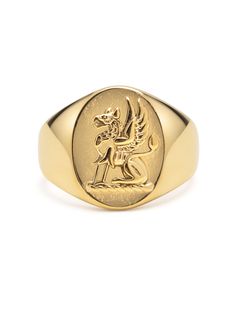 Ring in Stainless Steel with Gold Plating Product Code: MRING_140 Designer's Notes The crest ring is a traditional ring design that is a must for every gentleman. The beautifully hand-crafted crest in our ring features a lion. The lion is a common charge in heraldry. It traditionally symbolizes courage, nobility, royalty, strength. Please note that all our pieces are crafted by hand and one-of-a-kind, and may therefore vary slightly in size, shape, and color. Symbolic Hallmarked Signet Ring For Formal Occasions, Symbolic Formal Signet Ring Hallmarked, Formal Symbolic Hallmarked Signet Ring, Classic Yellow Gold Engraved Ring With Coat Of Arms, Symbolic Rings With Polished Finish For Commemoration, Ceremonial Symbolic Ring With Polished Finish, Classic Formal Rings With Coat Of Arms, Classic Oval Signet Ring With Coat Of Arms, Classic Hallmarked Signet Ring For Commemoration