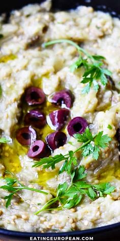 an oatmeal with olives and parsley in a bowl