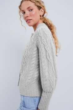 Our best-selling cardigan, updated in luxe cashmereChunky, cozy and always chic- the Gray Cashmere Colette Cardigan takes the very best elements from the classic style and updates it with exaggerated bishop sleeves, gold buttons, and a slightly cropped but not too short length that makes it perfect for layering over dresses or styling solo with high waisted pants. Dressed up or down, in the office or out to dinner, the possibilities are endless with this transitional piece.Our Favorite Details: Gray Cashmere, Kids Sale, The Gray, Too Short, Gold Buttons, High Waisted Pants, Cable Knit, Clothing And Shoes, Classic Style