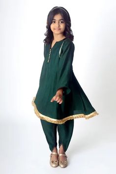 Bottle green kurta with tassel and gota embroidered hem. Paired with pant.
Component: 2
Pattern: Embroidery
Type Of Work: Tassel, gota
Neckline: Notched
Sleeve Type: Full sleeves
Fabric: Burberry
Color: Green
Other Details: 
Embroidered border
Front potli button detailing
Occasion: Festive and Wedding - Aza Fashions Green Straight Kurta Set With Embroidered Border, Green Long Sleeve Kurta With Embroidered Border, Fitted Green Kurta With Cutdana, Semi-stitched Green Kurta With Embroidered Border, Green Floor-length Kurta With Cutdana Detail, Types Of Work, Girl Online, Green Girl, Luxury Sale