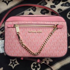 Nwt Michael Kors Jet Set Large Logo Pink Crossbody Bag. 9.5"W X 6.5"H X 2"D. The 4th And All Pictures After Are All More True To Color Pictures Of Bag Then First Three Pictures Due To Lighting. Logo Pink, Pink Crossbody Bag, Color Pictures, Denim Skirt Women, Saddle Brown, Skirt Women, Pink Logo, Distressed Black Jeans, Purses Michael Kors