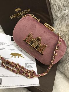 This is a very beautiful Sabyasachi-inspired lightweight sling bag. It can be a great addition to your bag collection. It will come with a chain/belt to carry it as a sling bag.  If you have any questions, please reach out to me personally.  Pair it with any Western or traditional outfit. Ready to ship from our home to yours! Sabyasachi Collection, Indian Luxury, Hand Clutch, Traditional Outfit, Wedding Clutch, Brand Bags, Bag Collection, Chain Belt, Velvet Material