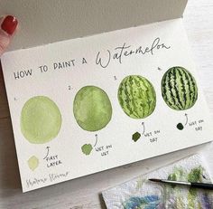 a hand holding a piece of paper that has watermelon on it and the words how to paint a watermelon