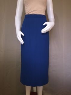 1980s textured pencil skirt Midi length, pleated for fit Take blue color Sits at smallest part of waist Classic Blue Office Skirt, Classic Blue Skirt For Office, Blue Pleated Formal Bottoms, Formal Blue Pleated Bottoms, Classic Blue Pleated Skirt For Spring, Blue Midi Length Pleated Skirt For Workwear, Chic Blue Pleated Skirt For Formal Occasions, Classic Blue Pleated Bottoms, Classic Blue Knee-length Pencil Skirt