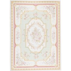 a rug with an ornate design on the front and back side, in pastel colors