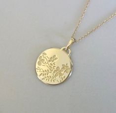 "14 Karat gold flower pendant, floral necklace, 14K gold necklace for women, vintage style flowers necklace, flowers pendant, unique flower pendant, an amazing holiday gift for her! * Free personalized engraving on the back! If you would like us to engrave something special like a date, name or initials on the back side, please mention in \" note to seller \" while making the purchase. Pendant size: 15 mm Necklace length: 45 cm * Available in 14K or 18K YELLOW, WHITE and ROSE gold. price listed Floral Wedding Bands, Gold Necklace For Women, 14k Gold Wedding Ring, Beautiful Tiaras, Fine Gold Jewelry, Unique Flower, Monogram Jewelry, Medallion Necklace, 14k Gold Necklace