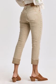 High rise cuffed slim straight leg jeans. The standout fit that comfortably rests slightly lower on the waist, shaping up effortlessly from the hip to mid thigh. Cuffed inseam on stretch denim with designer color palettes, washed and brushed for softness.9 1/2" Front Rise (include waistband), 13 1/2" Leg Opening, 28" inseam; 25" with 3" cuffed hem (Size 27) SUPER STRETCH: Plenty give, may go down one size 90% COTTON 8% POLYESTER 2% SPANDEX Machine wash cold, Tumble dry low Imported Zip fly and b Trendy Mid-rise Jeans With Rolled Hem, Trendy High Rise Jeans With Rolled Hem, Trendy High-rise Jeans With Rolled Hem, High Rise Jeans With Rolled Hem, Straight Leg Bottoms With Rolled Hem For Fall, Color Palette Design, Slim Straight Jeans, Khaki Color, Color Khaki