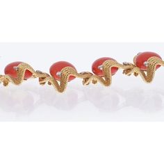 Indulge in the timeless elegance of the David Webb 18K Yellow Gold Coral And Diamond 1960's Bracelet. This exquisite piece is a true testament to the brand's commitment to craftsmanship and beauty. Crafted in 18K yellow gold, the bracelet features flexible links adorned with fluted cabochon coral, adding a touch of vibrant allure to the design. The round diamond accents gracefully enhance the piece, lending a touch of sparkle and sophistication.With its one-line design, this bracelet exudes a ca Designer Yellow Gold Cabochon Jewelry, Designer Jubilee Bracelet For Evening, Luxury Yellow Gold Cabochon Bracelets, Luxury Yellow Gold Bracelets With Cabochon, Luxury Gold Oyster Bracelet For Anniversary, Exquisite Yellow Gold Diamond Bracelet For Formal, Exquisite Yellow Gold Diamond Bracelet For Formal Occasions, Designer Diamond Gold Bracelet For Formal Occasions, Luxury Cabochon Bangle Jewelry