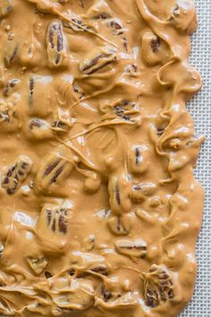 a pan filled with peanut butter frosting on top of a table