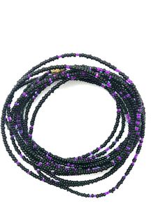 Beautiful black and purple waist beads for the adventurous soul which are gorgeous on any skin tone!  These waist beads have metallic clasps.Waist beads, Boho waist beads, African waist beads, Belly Chain, Boho Beads, Belly Beads - Dusk Lilac Waist Beads**** PROPERLY MEASURE YOUR WAIST ****Place the measuring tape at the exact area you prefer to wear the waist beads.Do not tuck in your stomach when measuring for belly chain.Allow for wiggle space when measuring for breathing room.Thank you for s Purple Beaded Necklace With Round Black Beads, Black Beaded Necklaces With Spacer Beads For Beach, Black Beaded Necklaces For Beach, Black Heishi Beads For Beach, Purple Festival Jewelry With Black Beads, Purple Jewelry With Black Beads For Festival, Black Beaded Necklace For Beach With Tiny Beads, Black Beaded Necklaces For The Beach, Beach Black Beaded Necklace With Tiny Beads